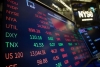 تجدد عمليات بيع الأسهم والسندات مع إستمرار إنتعاش الدولار