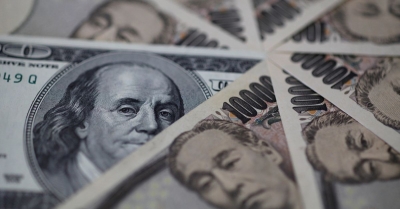 التهديد بالتدخل يحد من ارتفاع الدولار إلى مستوى جديد مقابل الين